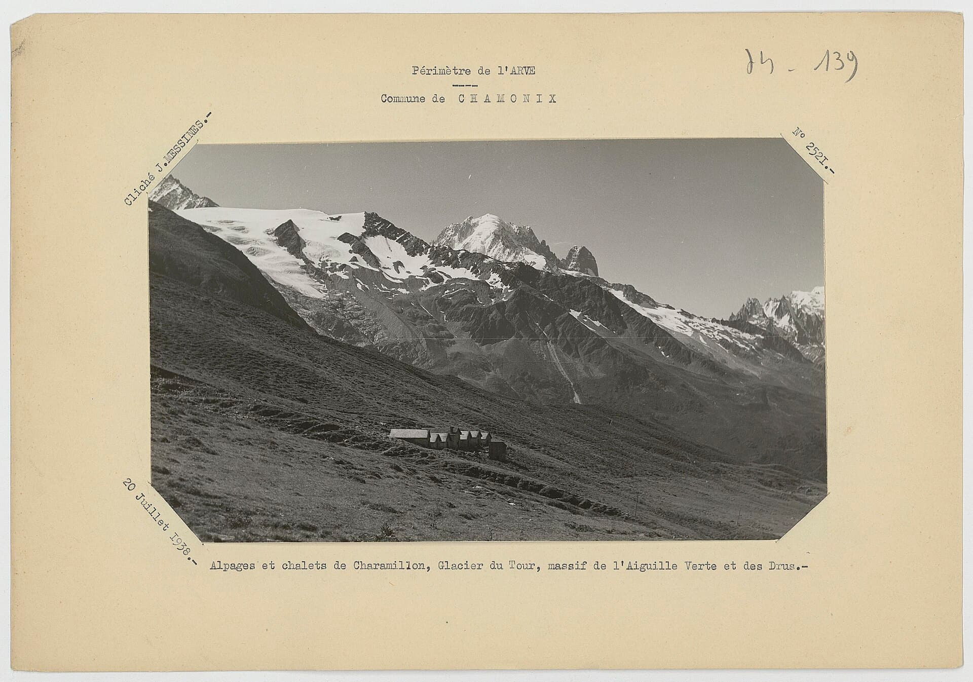 A 1938 catalogue photograph of chalets and grazing land beneath the glaciers and peaks above Charamillon.