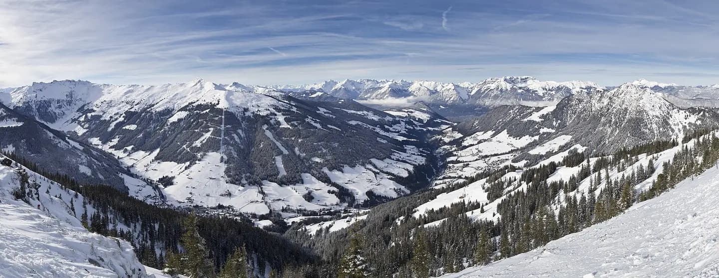 Alpbach valley - panoramic view from Eaggeralm/Schatzberg in Wildschönau . Tyrol , Austria . View to Karwendel mountains (Southside, Inntal valley), clouds in valley of Achensee near mountain Ebner Joch