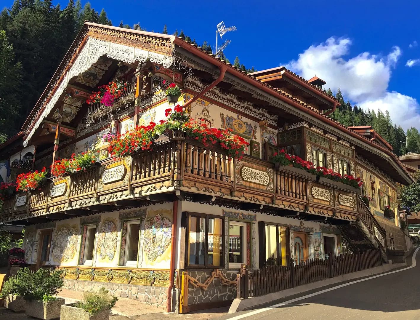 This highly decorated house is in the historical centre (centro storico) of Canazei, Val Fassa, Dolomites