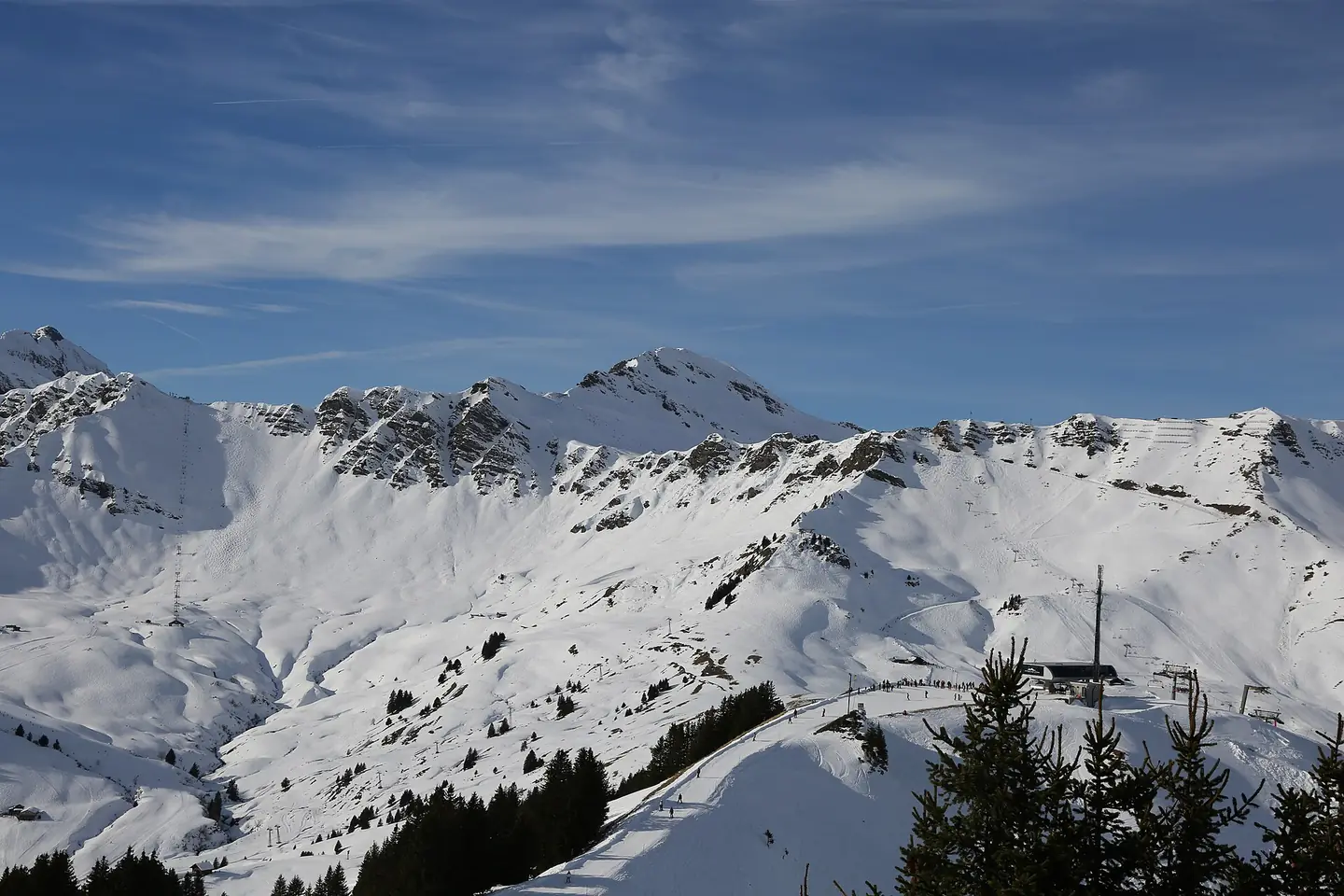 Skiing in Champery in the Swiss part of Portes de Soleil seen from Planachaux - Croix de Culet