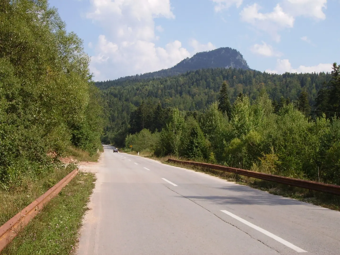 Bosnia, Magistral road Nr. 5 between Pale and Podgrab. Background: Hodža peak (1376 m), part of Ravna planina, Jahorina range