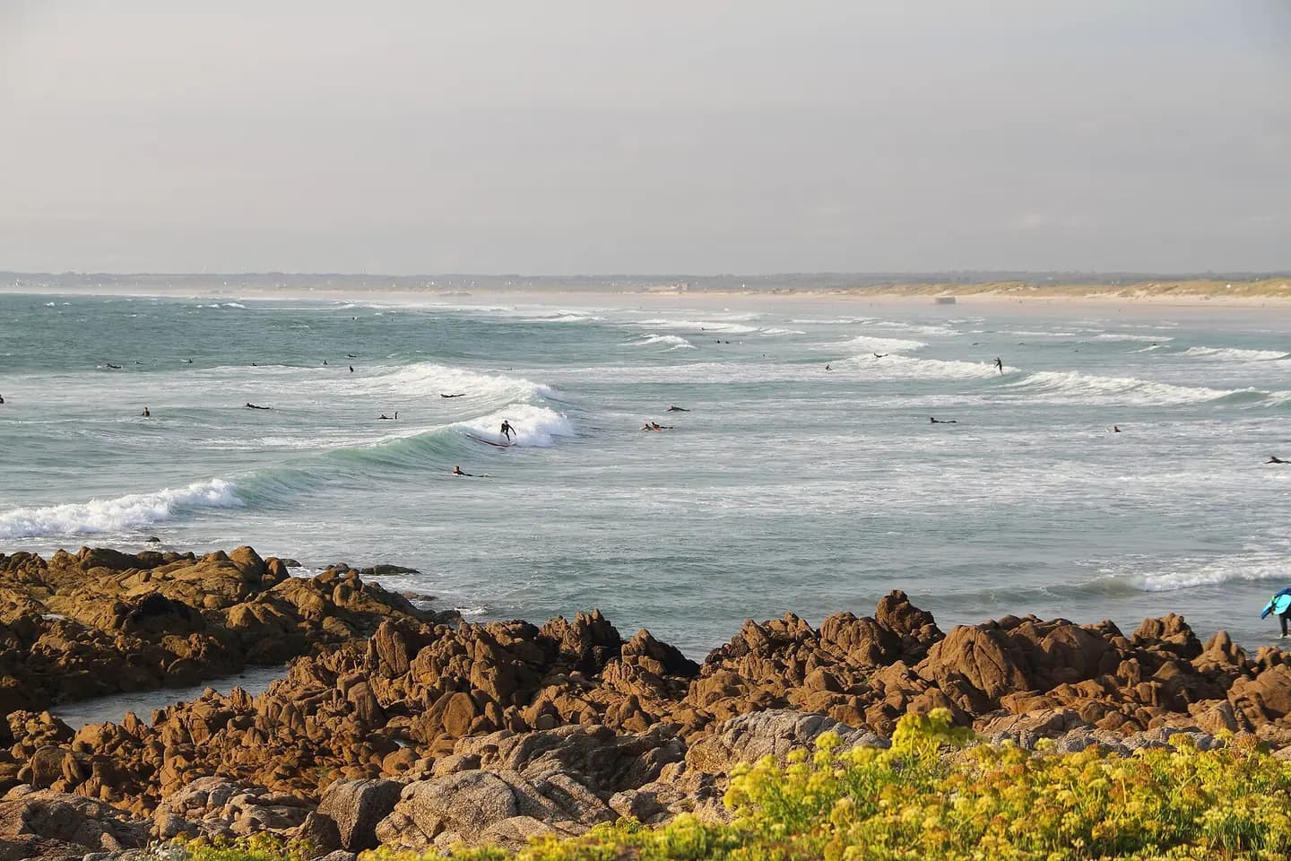 Surfer on the beach at Pointe de la Torche, Bretagne