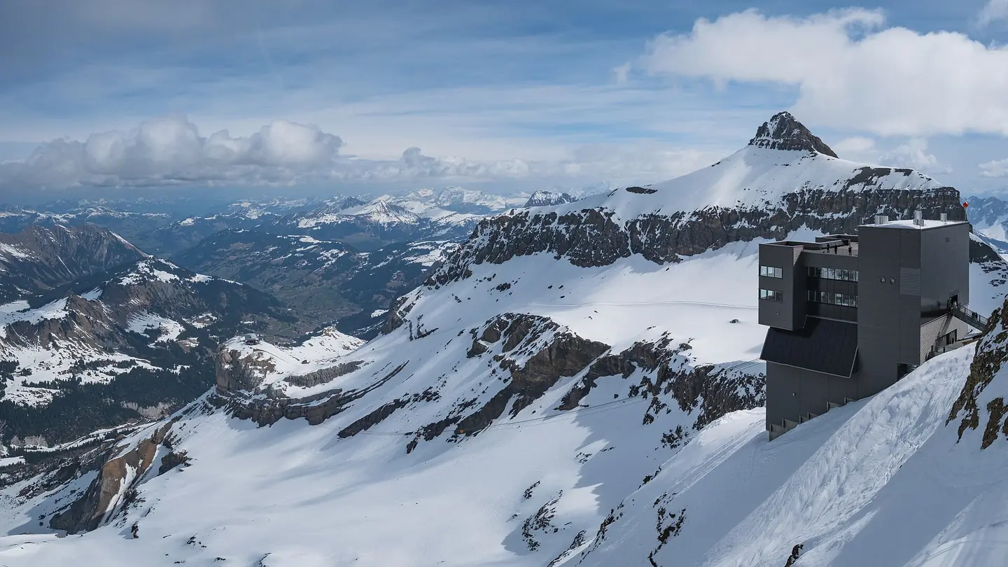 The cable car running from Cabane-des-Diablerets to Glacier-des-Diablerets, as seen from the Peak Walk footbridge at the Glacier 3000 station, Canton of Vaud, Switzerland