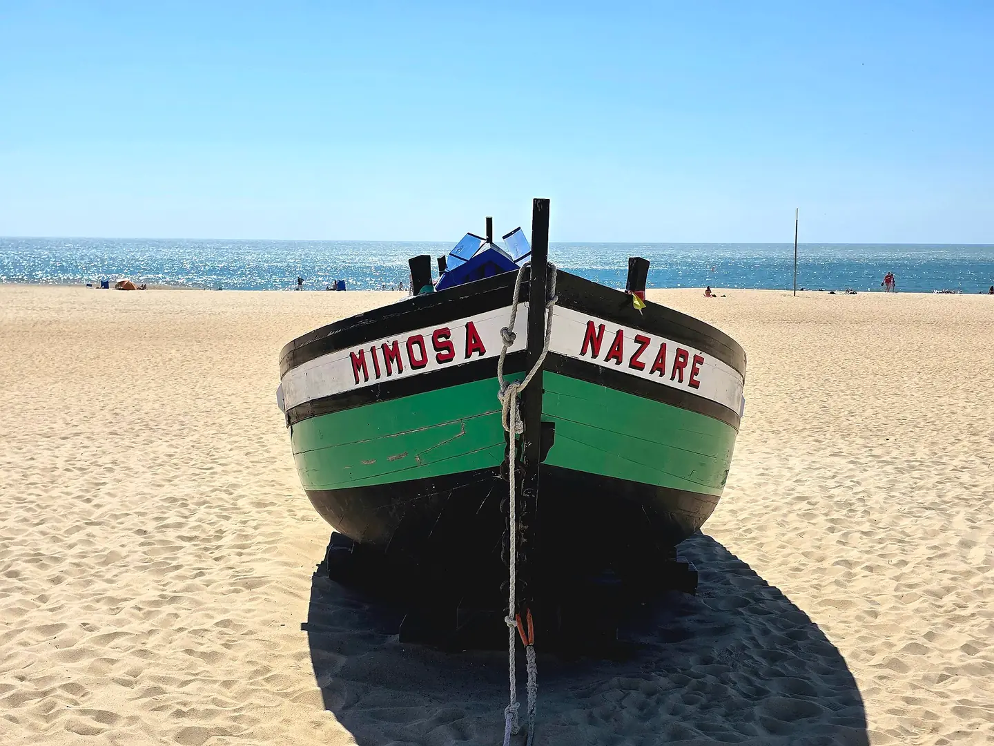 Historic fishing boat on the beach at Nazaré