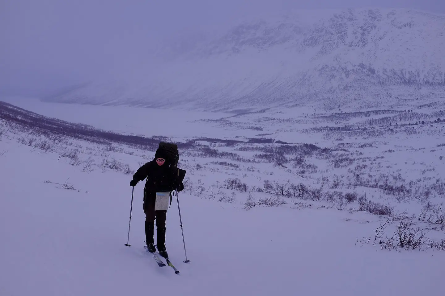 Skiing up the Hyttdalen valley from Gjevilvatnet lake, Trollheimen, Oppdal, Møre og Romsdal, Norway
