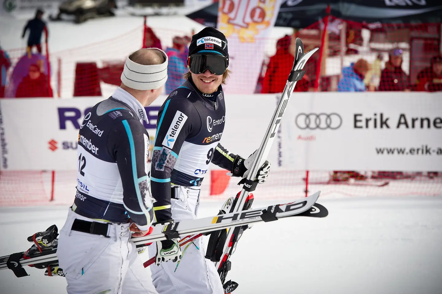 Kjetil Jansrud (r) smiles at Truls Ove Karlsen as they walk off the mountain following the 2011 men's giant slalom event at Trysil in Norway. photo © Ola Matsson