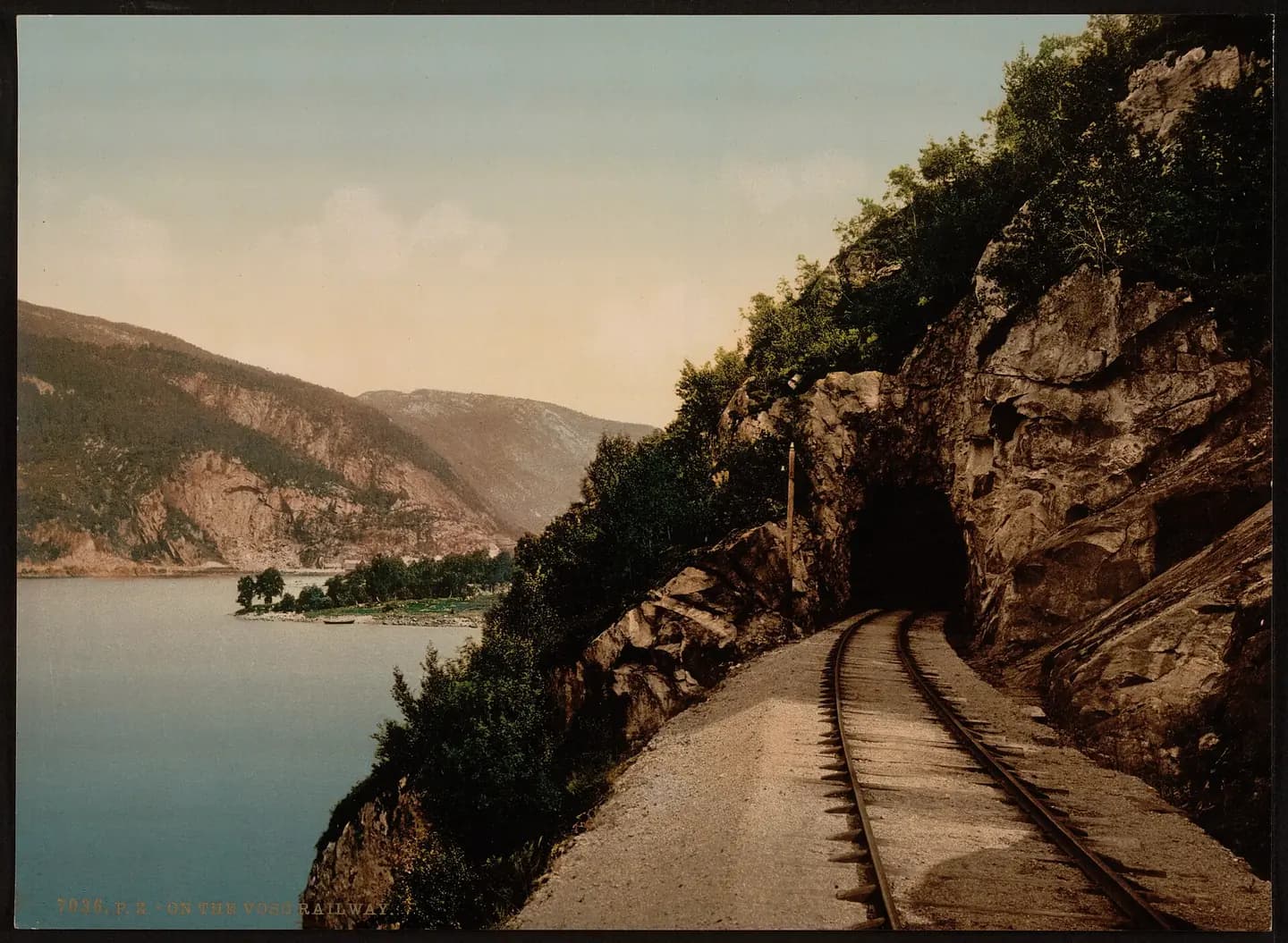 Print shows the Vossebanen (Voss Railway), possibly passing Evangervatnet (Evanger Lake), Hordaland County, Norway. (Source: Flickr Commons project, 2009)