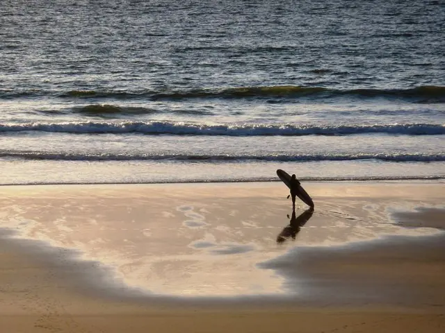 Lone Surfer at Woolacombe Beach