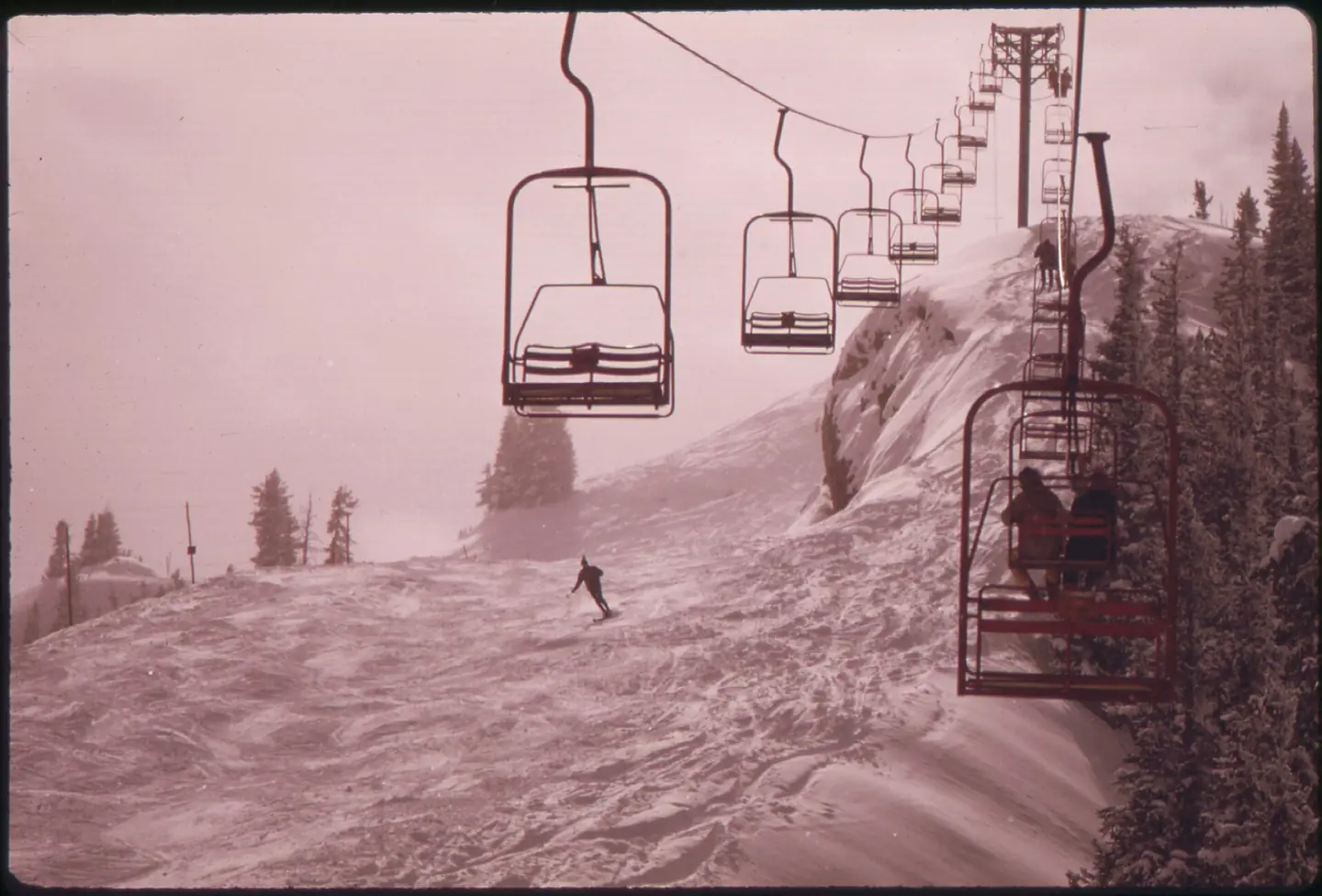 All the lifts at aspen are chairlifts. This one is going up 11,800 feet on Aspen Highlands Mountain, highest ski area at Aspen