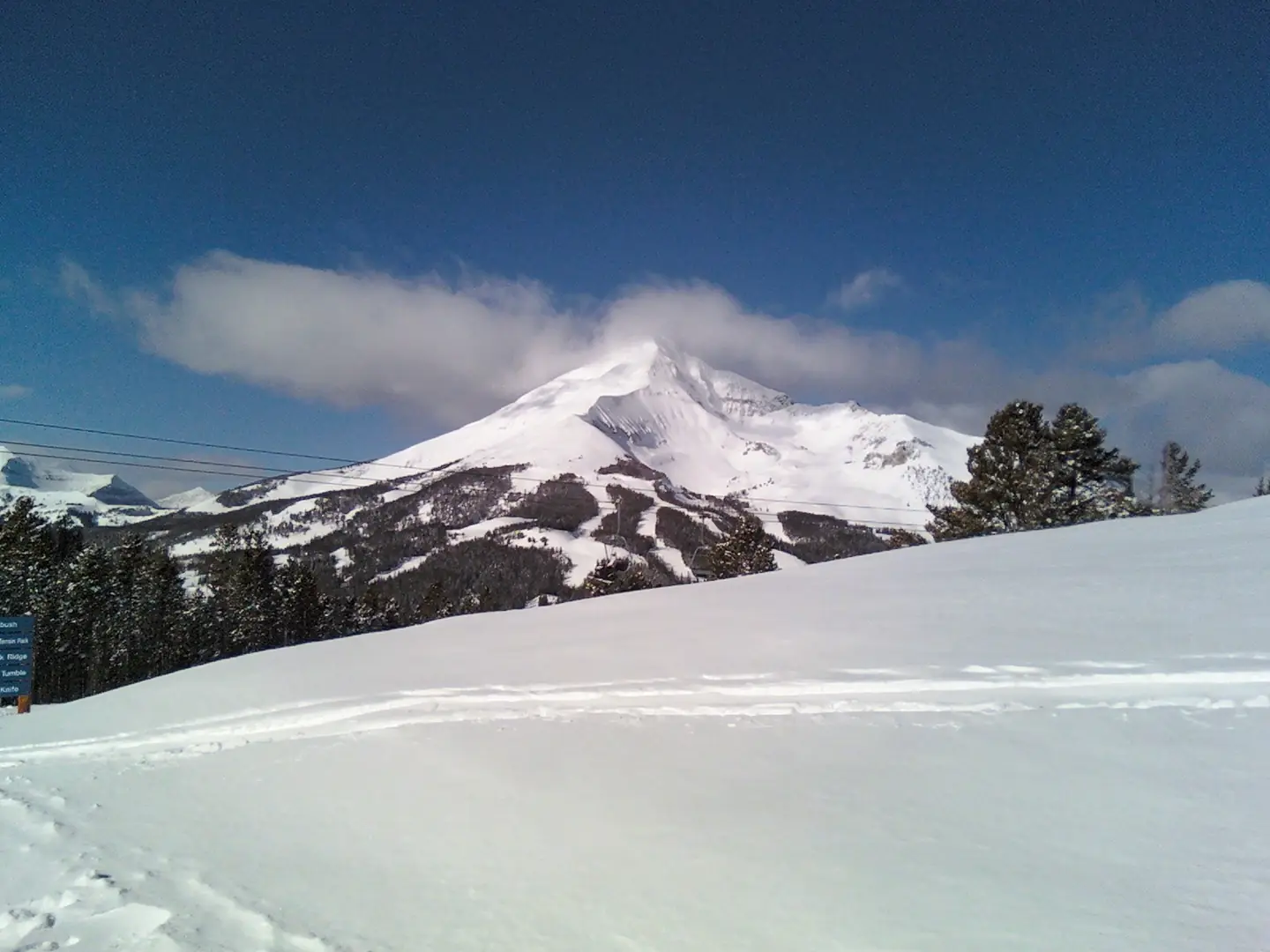 A picture of Lone Peak Montana, the principal mountain of the Big Sky ski resort in Montana, USA. The picture was taken from a smaller mountain opposite Lone Peak with a 2 megapixel Motorola Cell Phone Camera