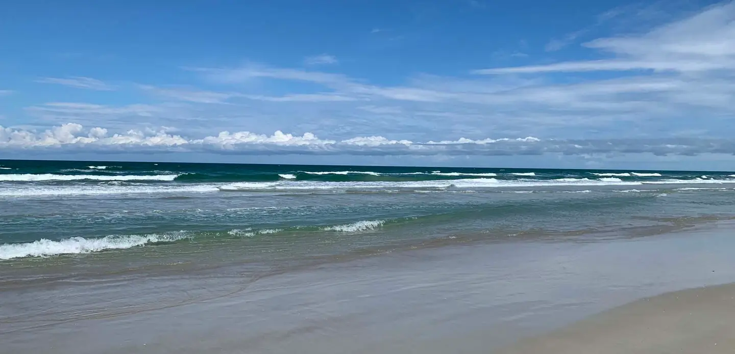 The gently sloping beach at New Smyrna Beach, Florida, provides excellent bodysurfing conditions