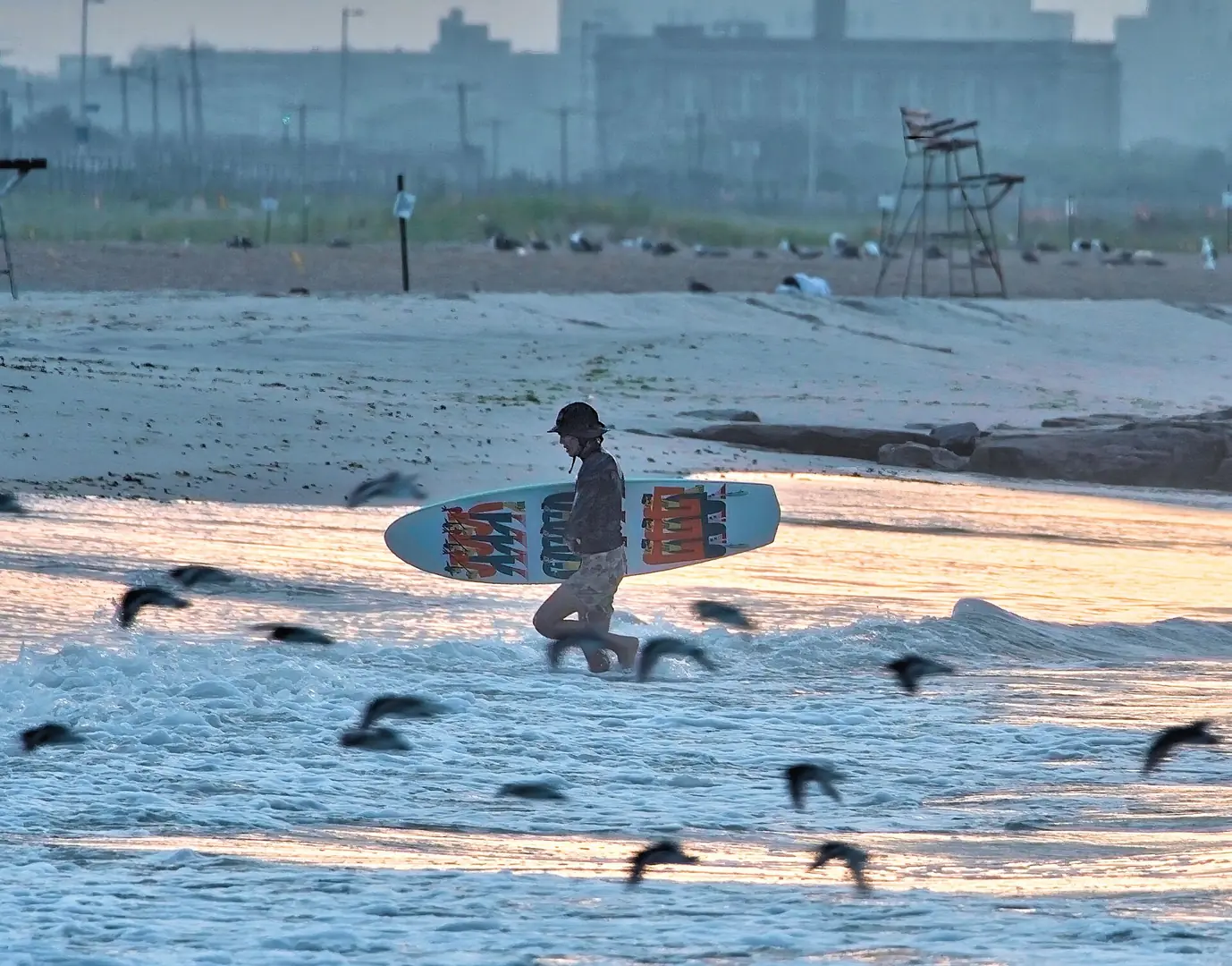 Rockaway Beach is the only surfing spot in New York City. It's just across an inlet from JFK Airport
