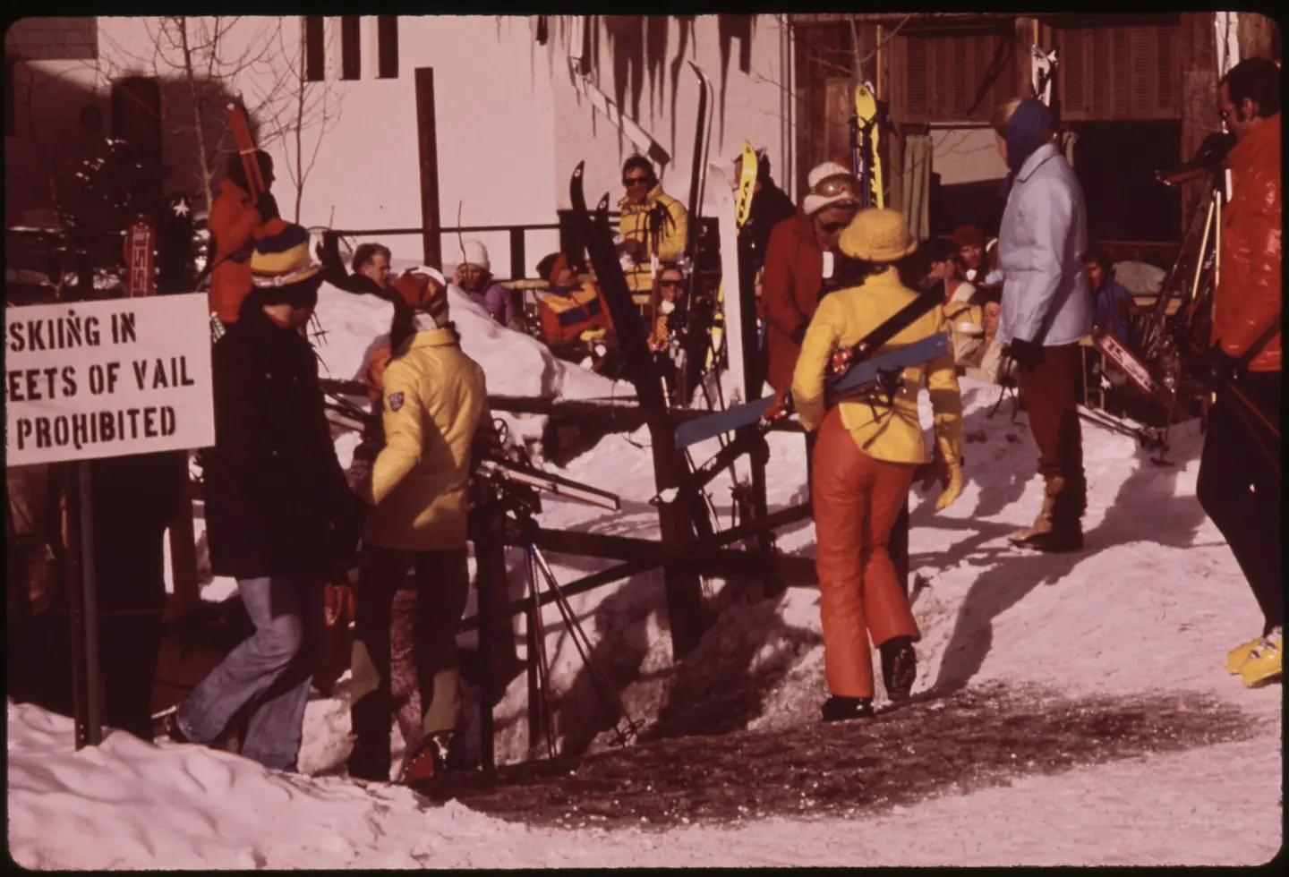 SKIERS RETURN TO VAIL VILLAGE AT THE END OF THE DAY
