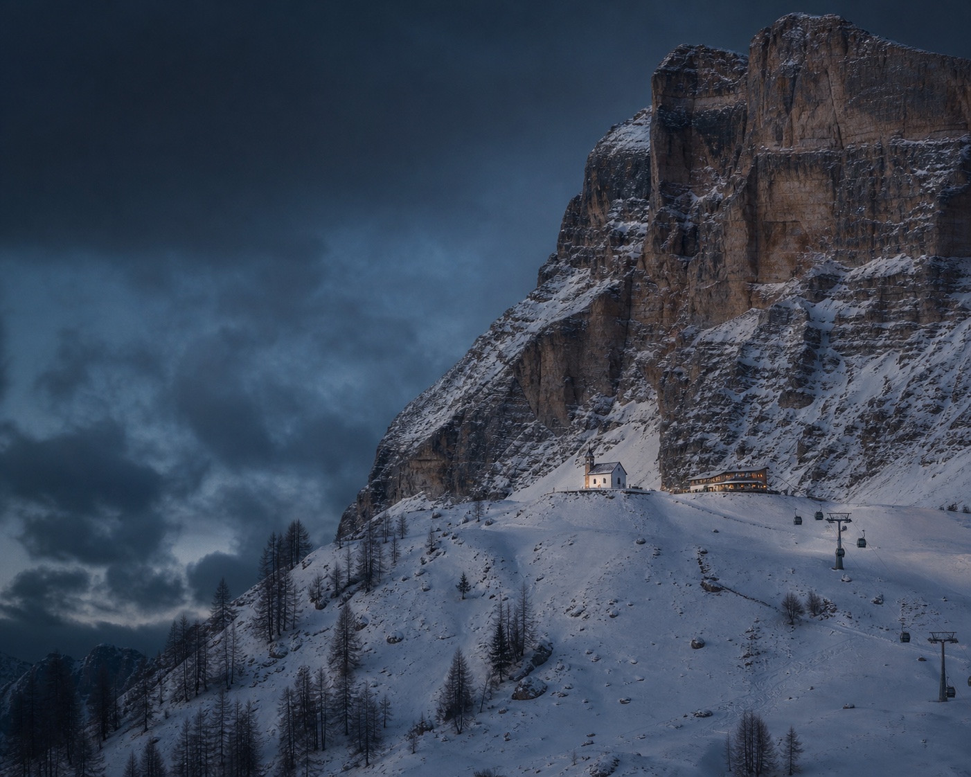 The Santa Croce sanctuary beneath Alta Badia's immense Sas dla Crusc