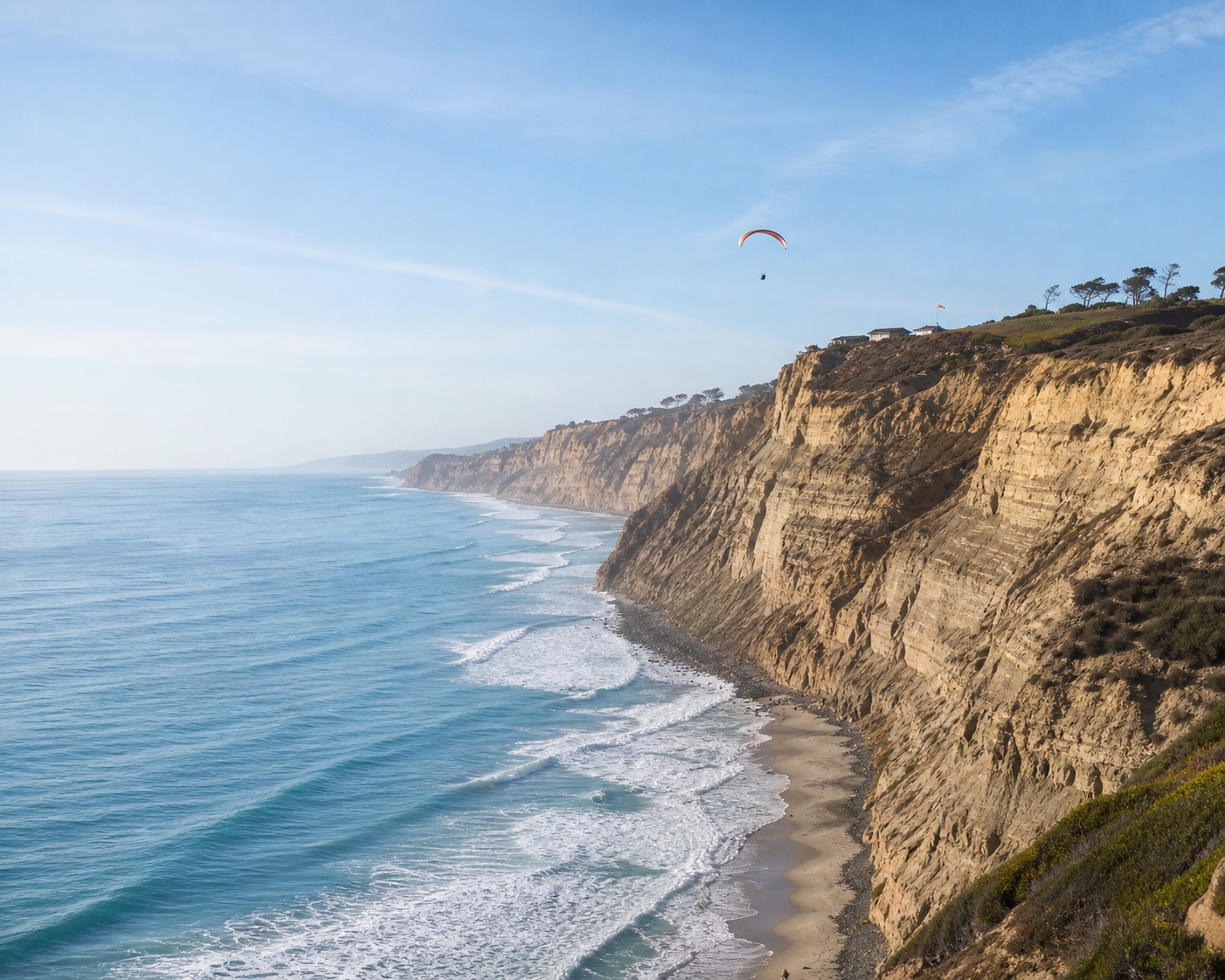 Black's Beach surf beneath the towering Torrey Pines cliffs and gliderport