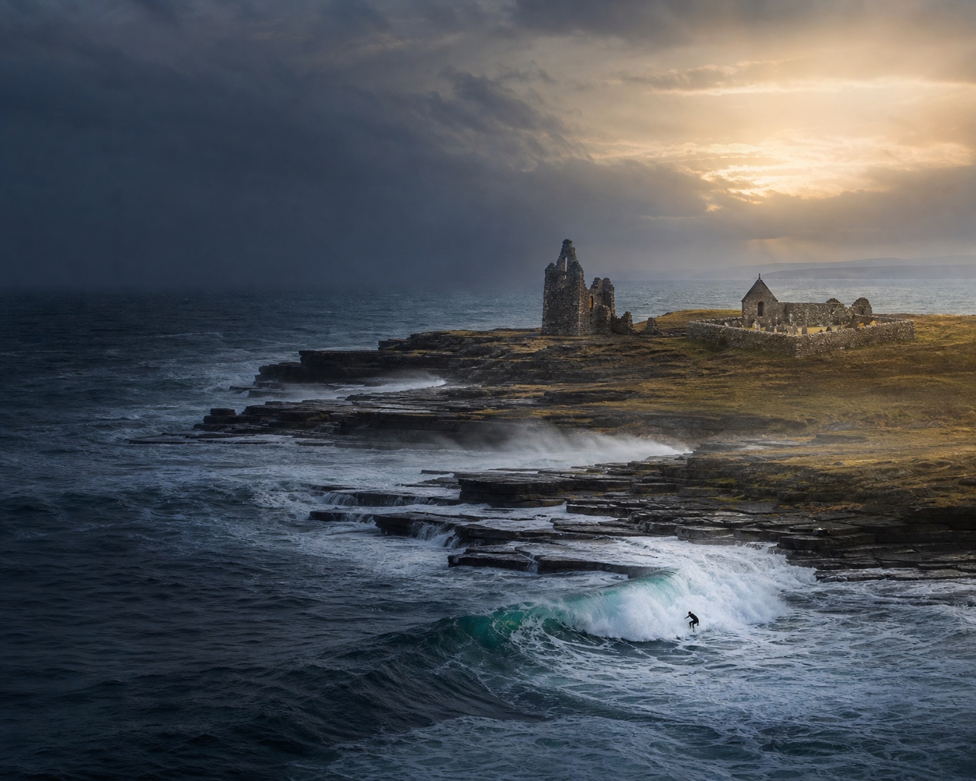 Brims Ness reef surf beside the castle farmhouse and chapel ruins