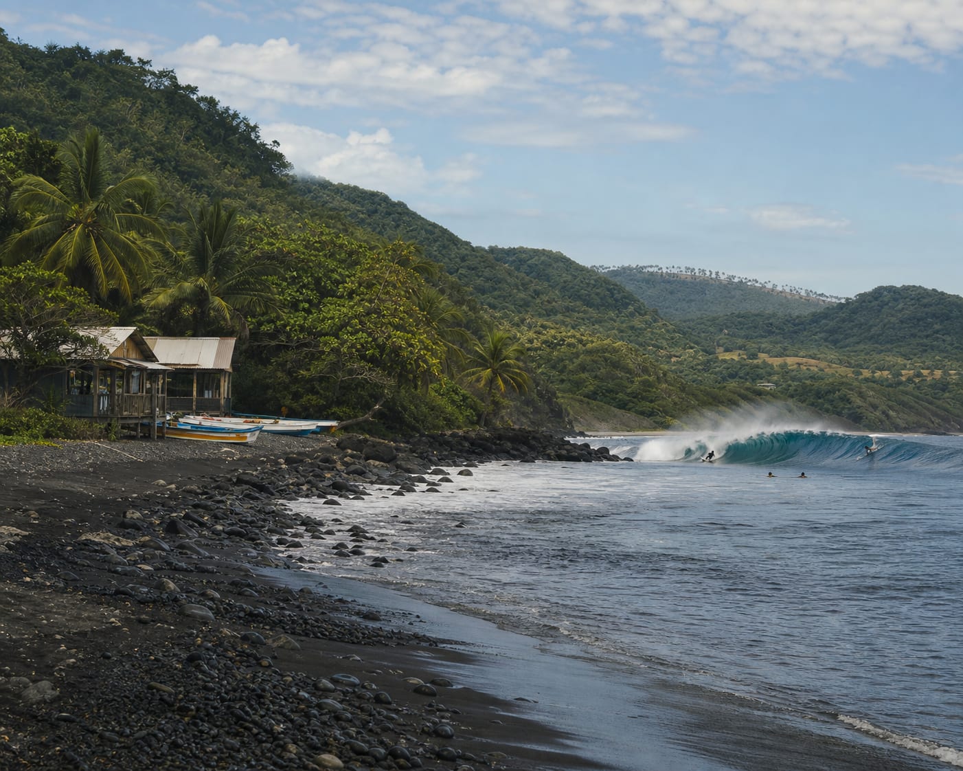 Bull Bay's Copa reef surf and dark shoreline beneath Jamaica's coastal hills