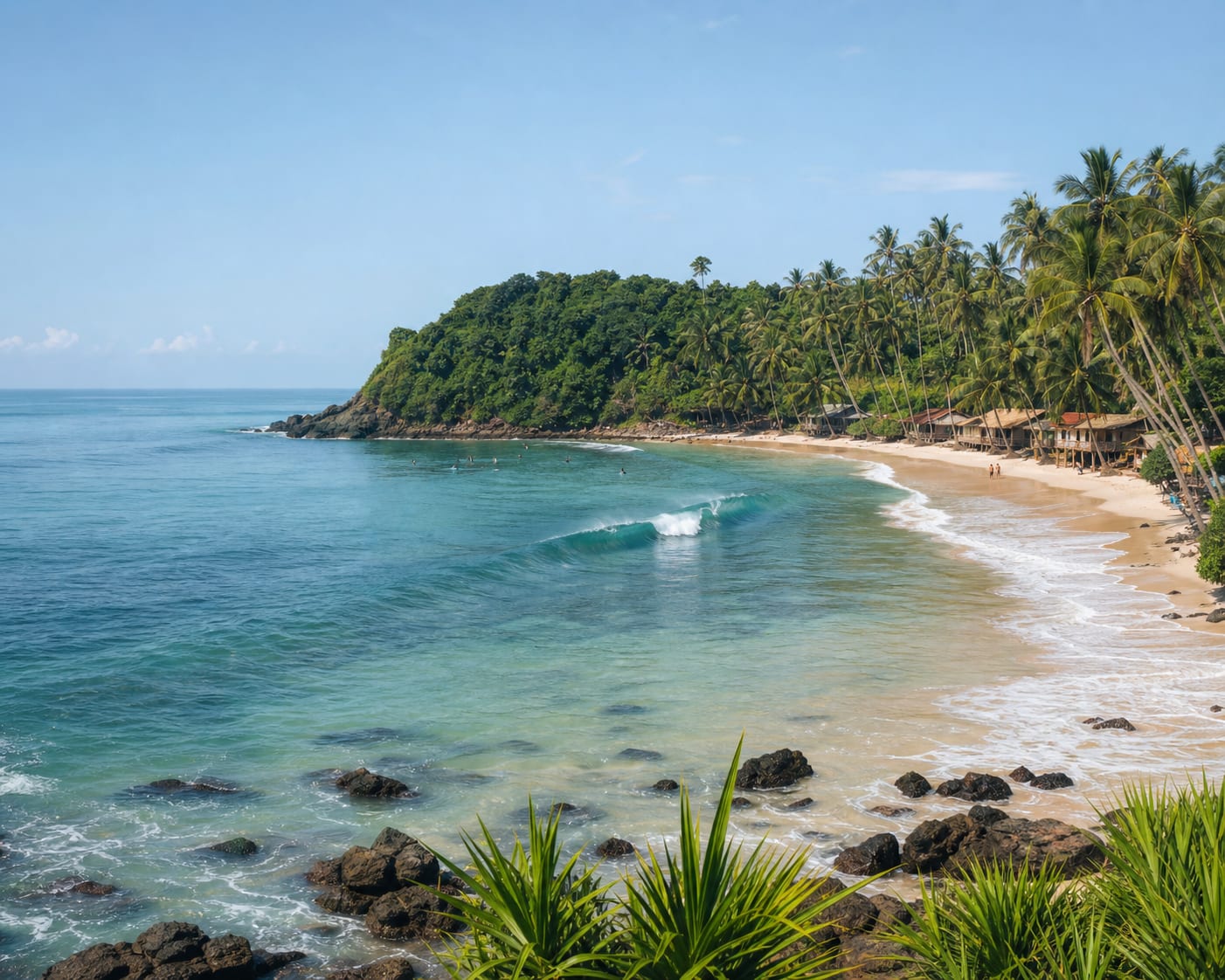 Hiriketiya surf inside its compact palm-lined horseshoe bay