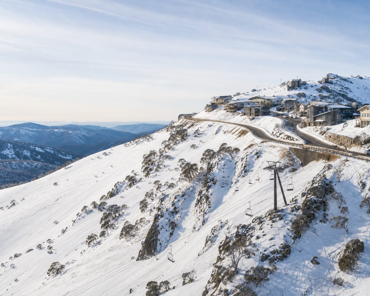 The Great Alpine Road crossing Mount Hotham's snowy summit village