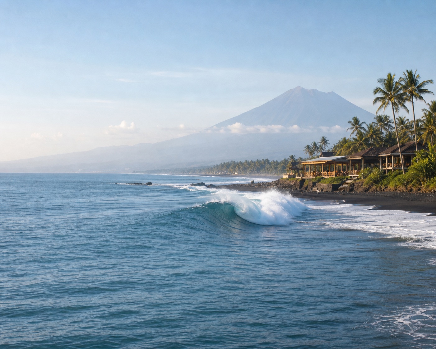 Keramas right-hander beside black volcanic sand and Mount Agung