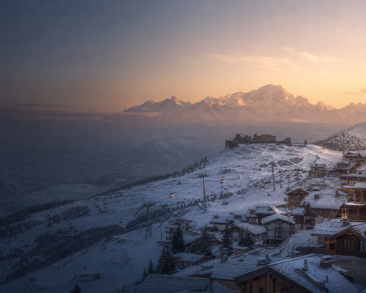 La Rosière's ruined Redoute fort, gondola and chalets beneath Mont Blanc