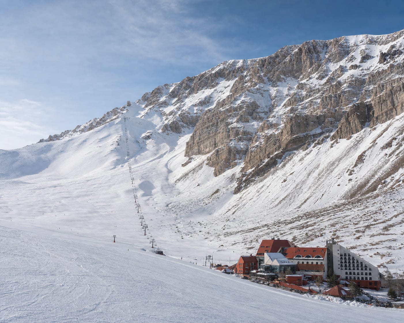Las Leñas chairlift climbing its immense treeless Andean amphitheatre