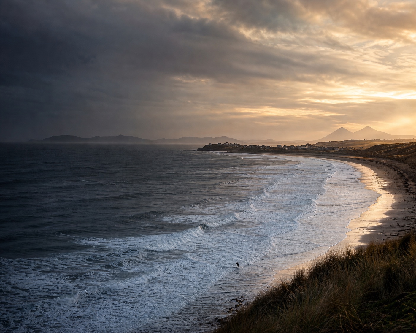 Atlantic surf sweeping past the wild dunes and links of Machrihanish Bay