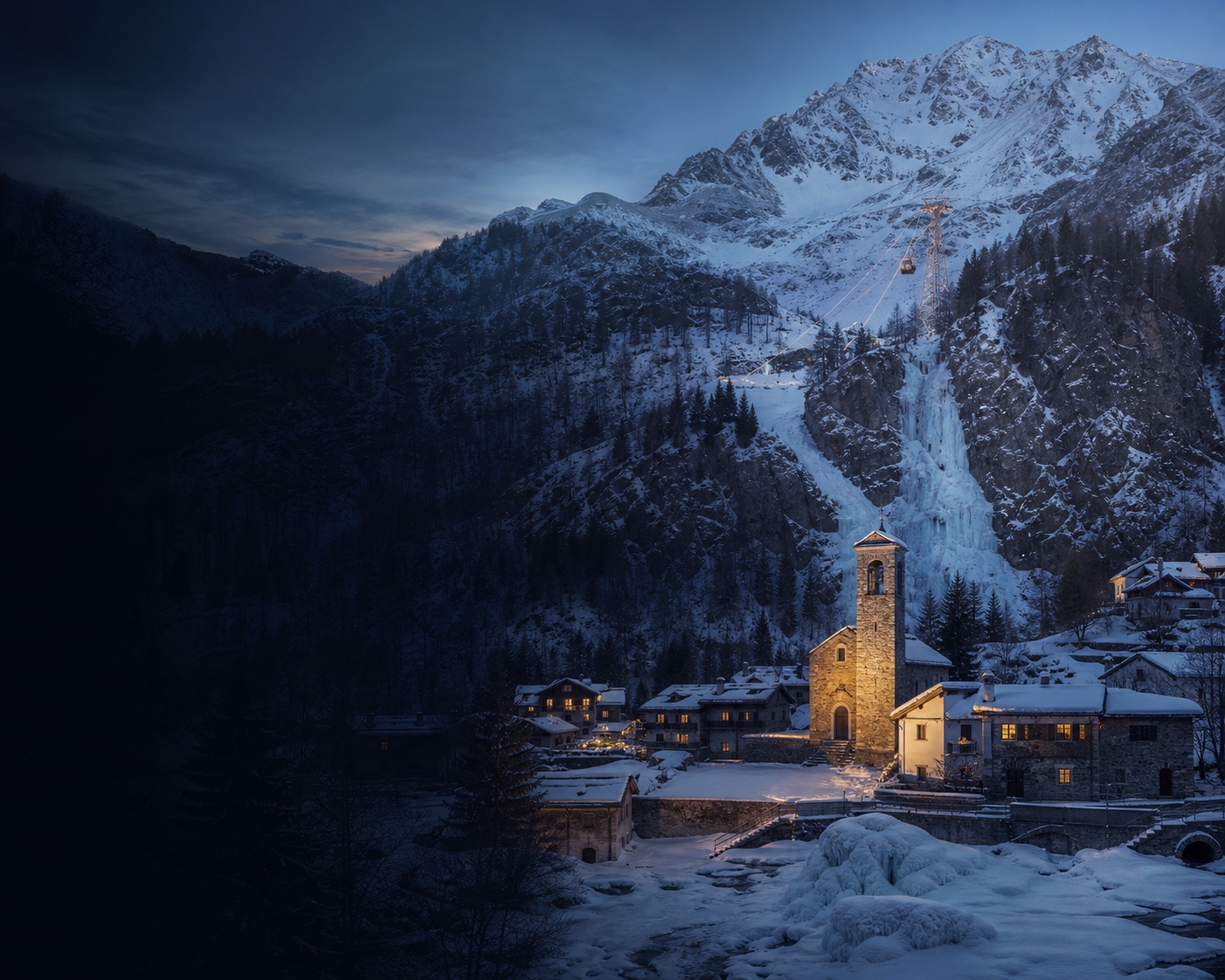 Madesimo village and church beneath the steep Groppera ski basin