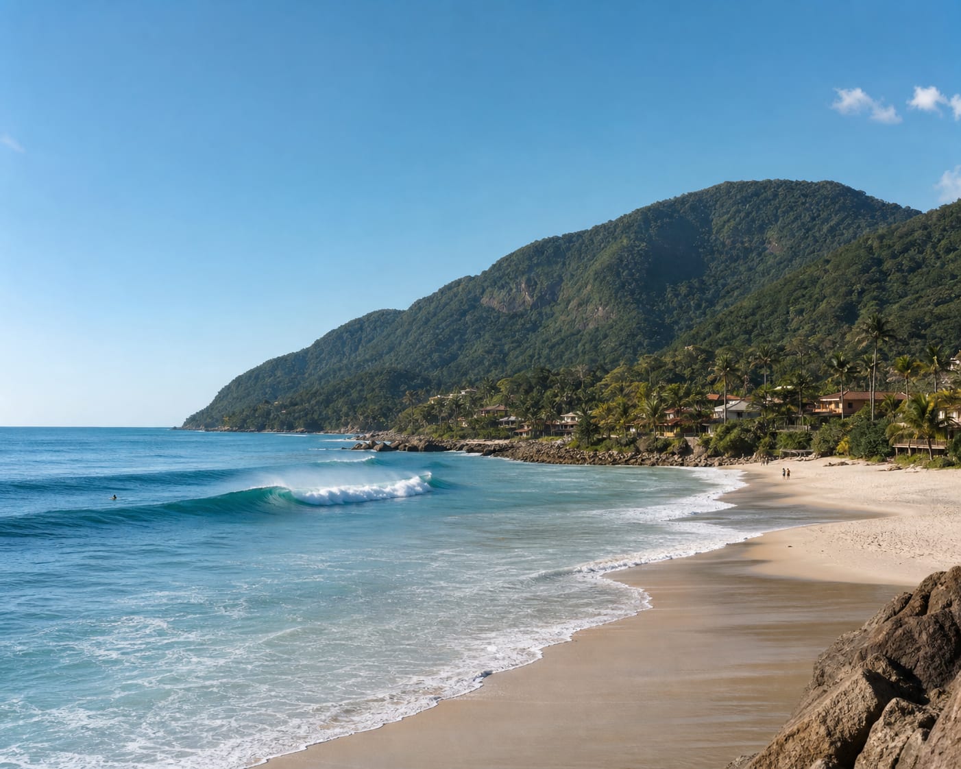 Maresias surf backed by the dense green slopes of the Serra do Mar