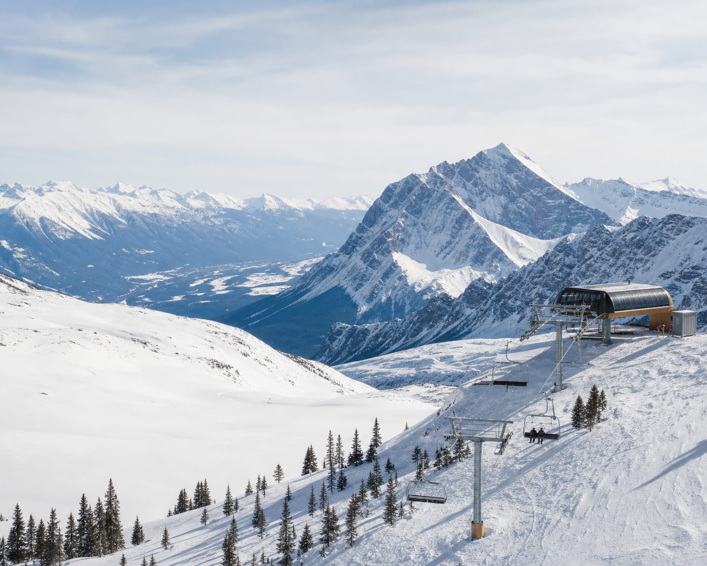 Marmot Basin chairlift crossing an alpine bowl in the Canadian Rockies