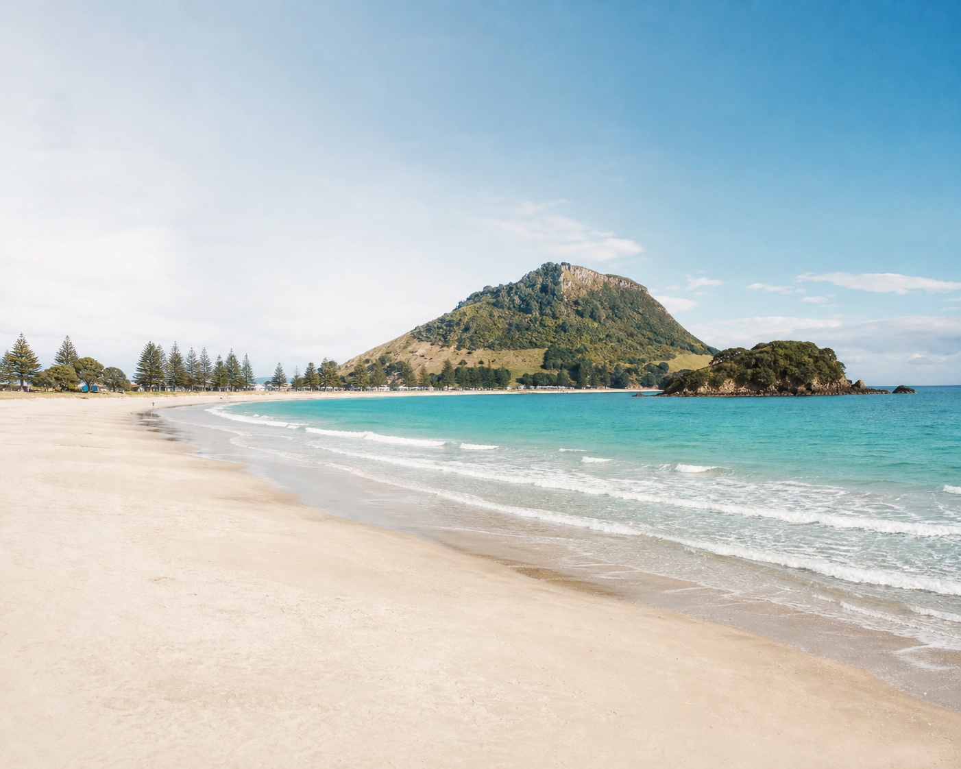 Mount Maunganui surf beneath Mauao and rocky Moturiki Island