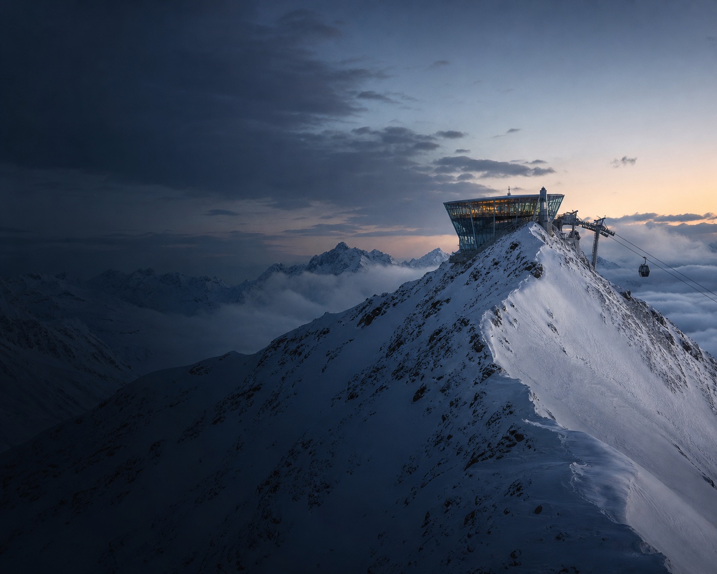 The glass-walled Top Mountain Star on the snowy Wurmkogl ridge above Obergurgl