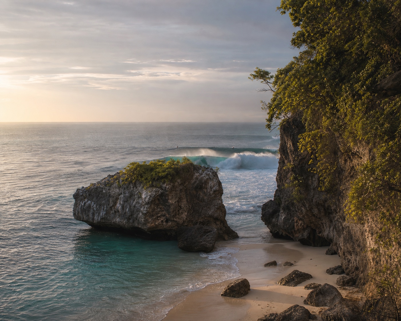 Padang Padang's limestone cove with a reef wave breaking beyond the rock gap