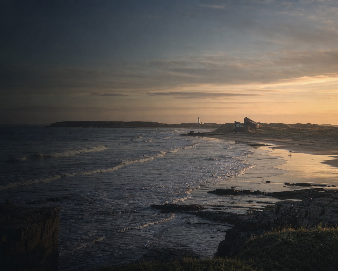 Rest Bay surf beneath its watersports centre with Sker Point beyond
