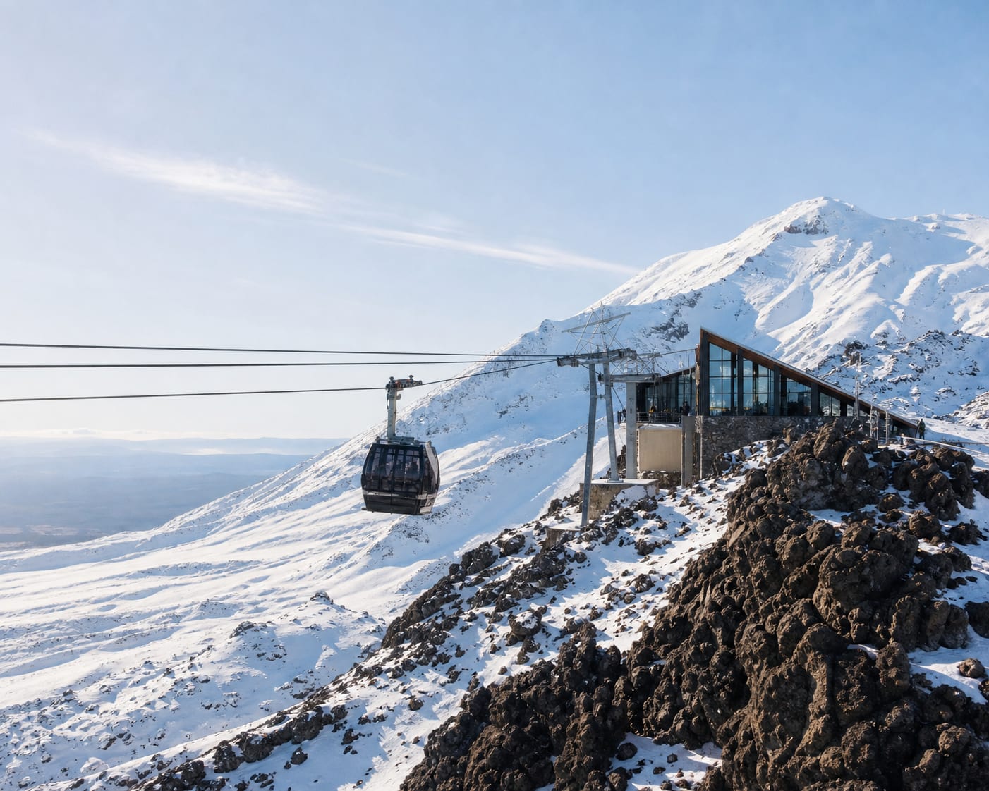 Sky Waka gondola beside Knoll Ridge Chalet on volcanic Mount Ruapehu