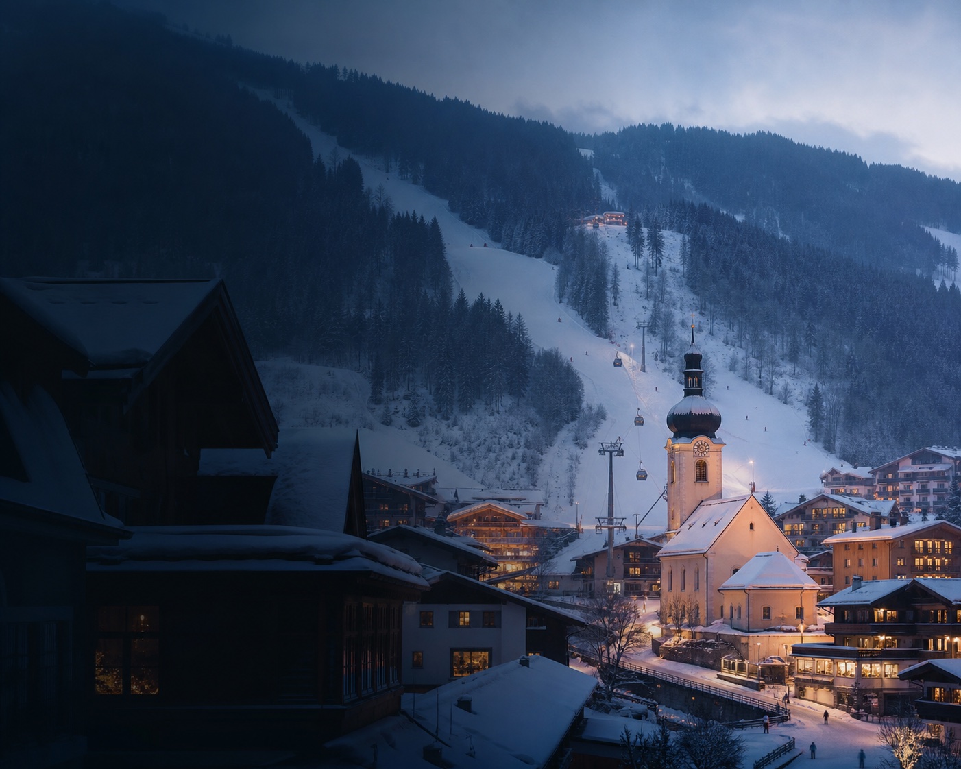 Saalbach's church, snowy village and gondola beneath the Schattberg
