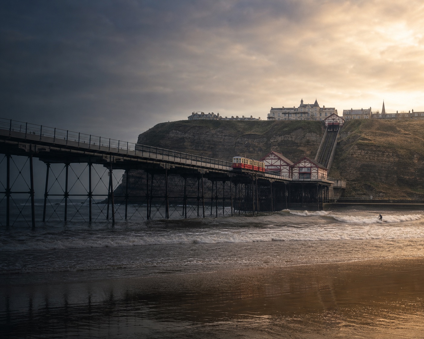 Saltburn's Victorian pier and cliff funicular above North Sea surf