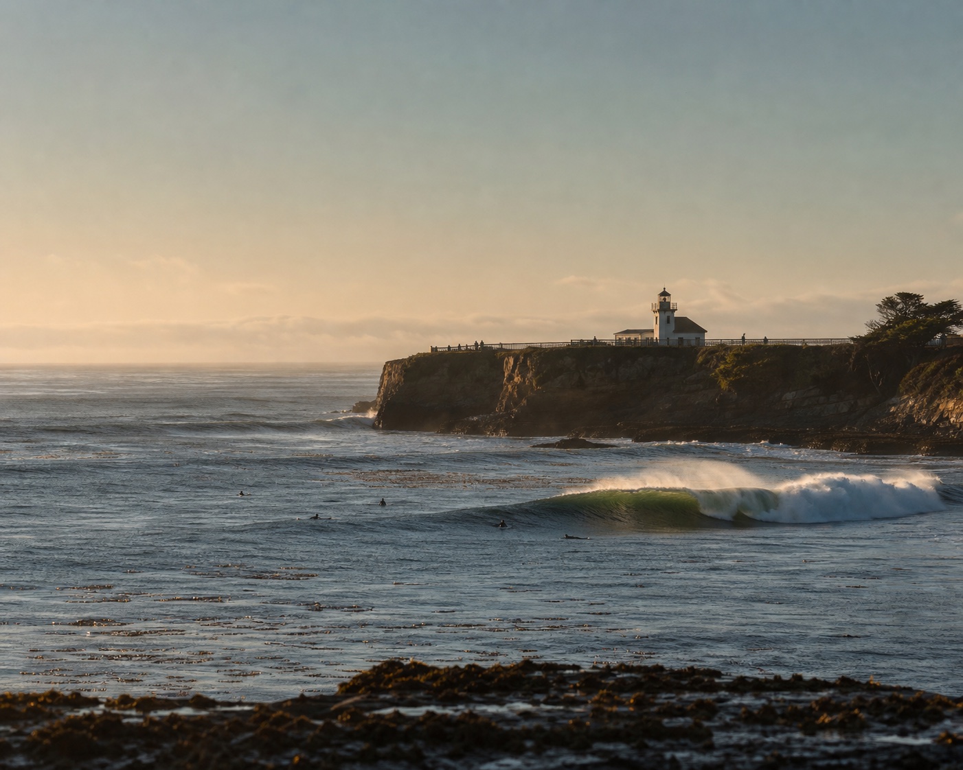 Steamer Lane surf beneath the Santa Cruz Surfing Museum lighthouse