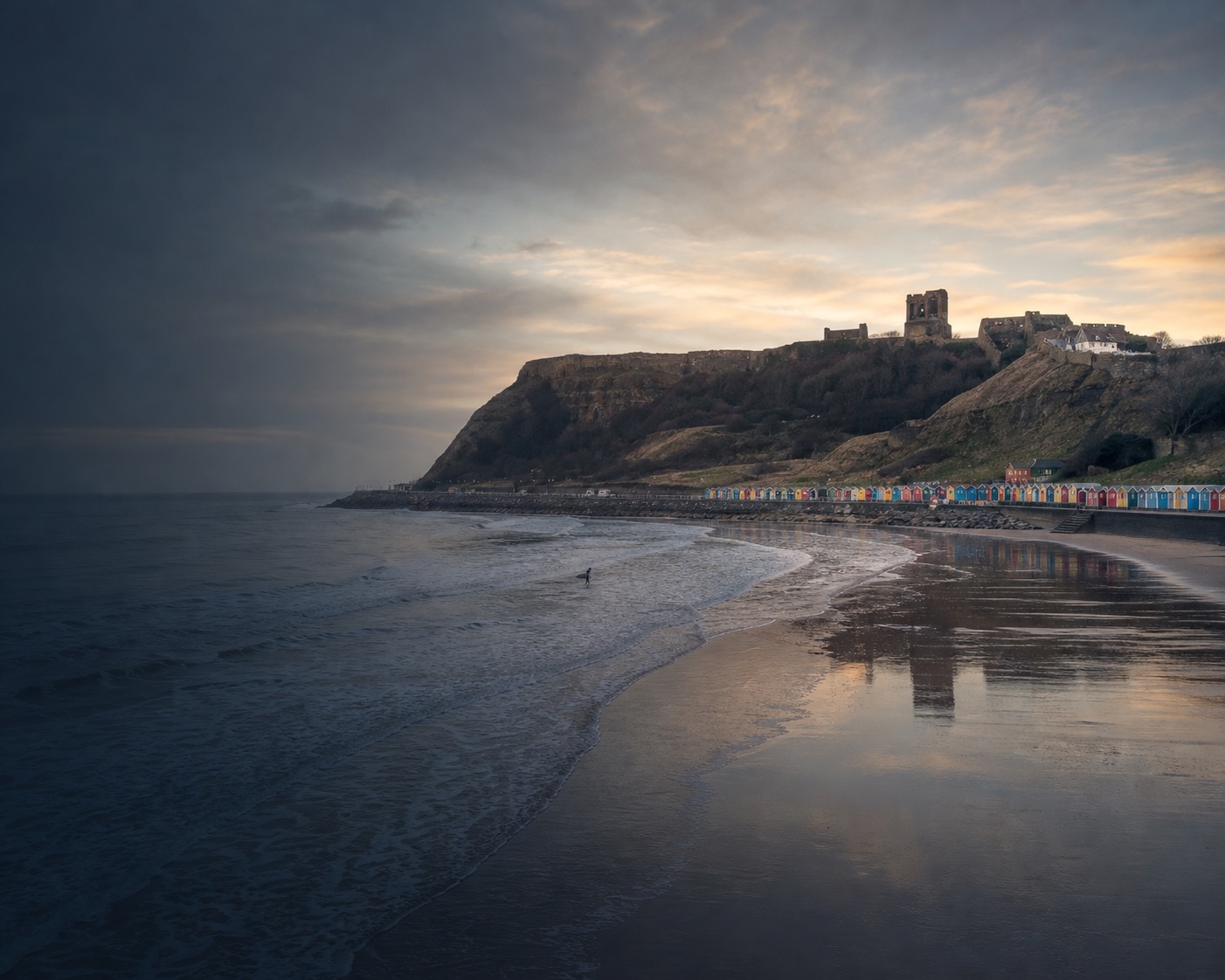 Scarborough North Bay surf, colourful chalets and castle-crowned headland