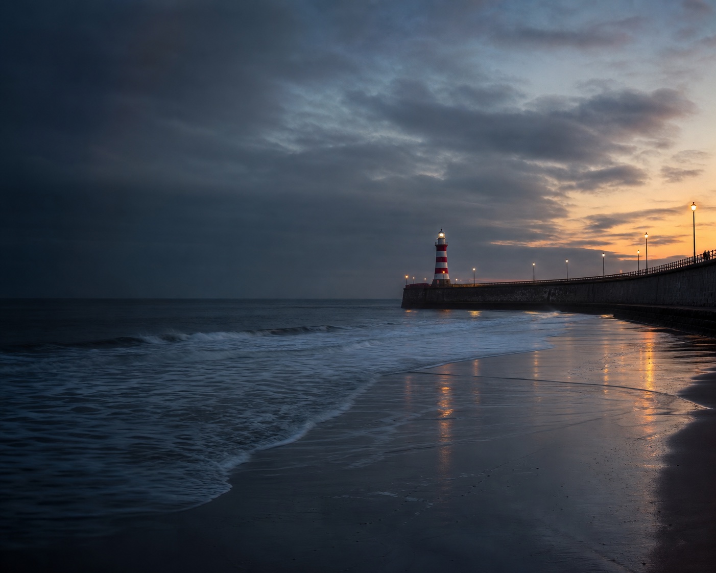 Seaburn surf reflecting Roker's curved pier and striped lighthouse