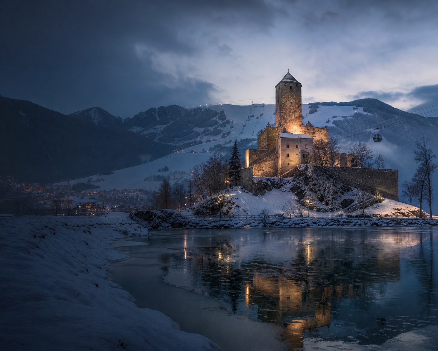 Laudegg Castle reflected in a frozen pond beneath the snowy Tyrolean plateau