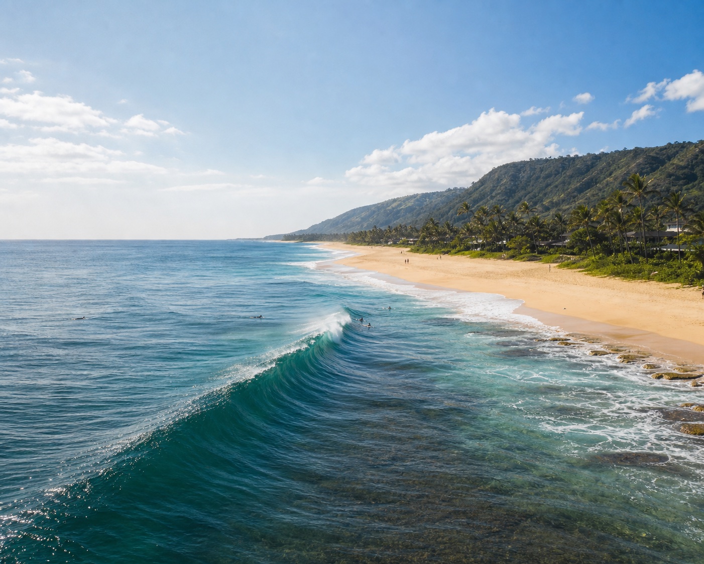 Sunset Beach's long reef wave beside the broad Oahu North Shore