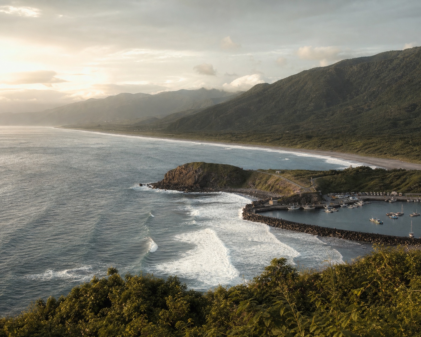 Jinzun's anchor-shaped headland, fishing harbour and surf coast near Taitung