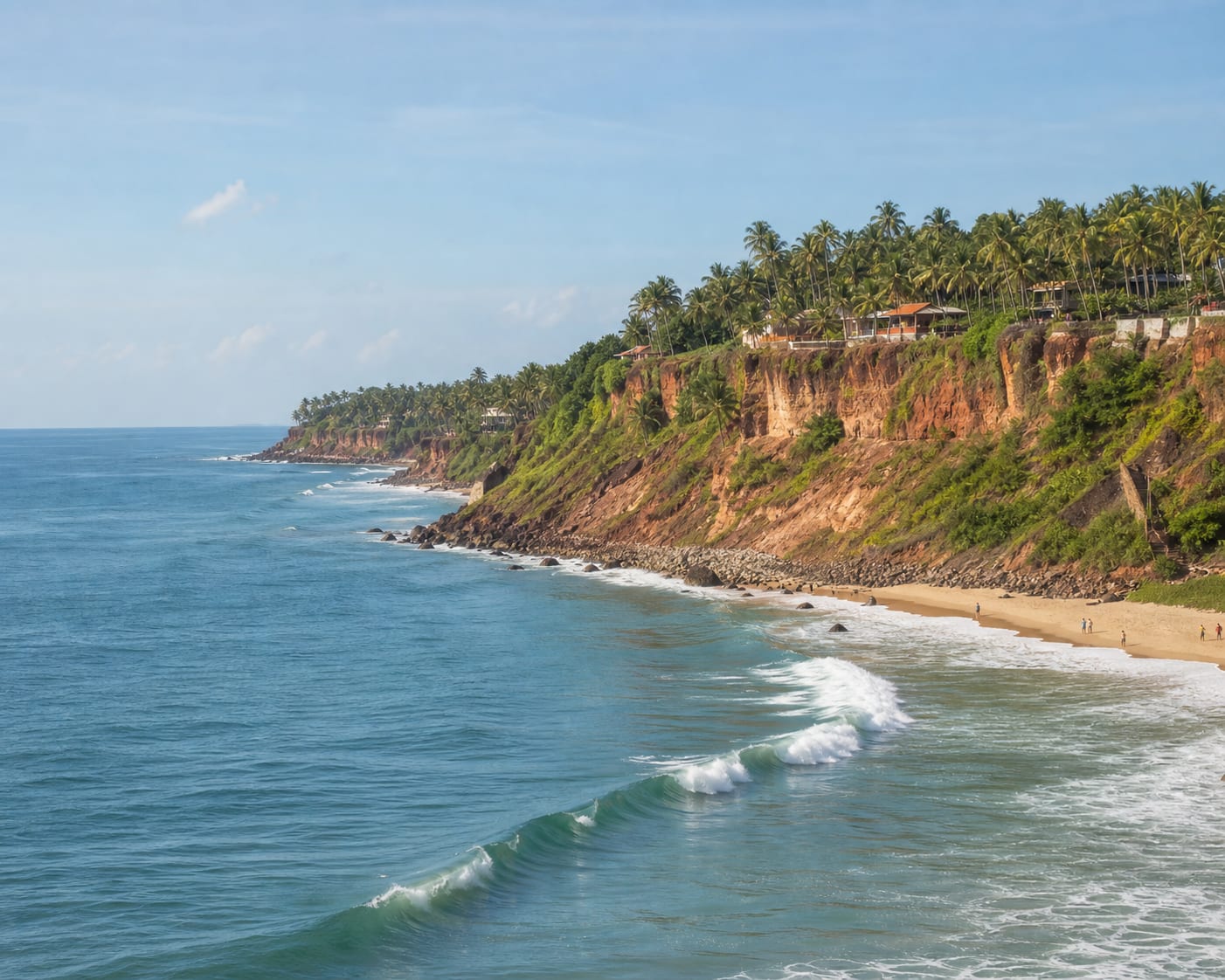 Varkala surf running below Kerala's distinctive red laterite cliff
